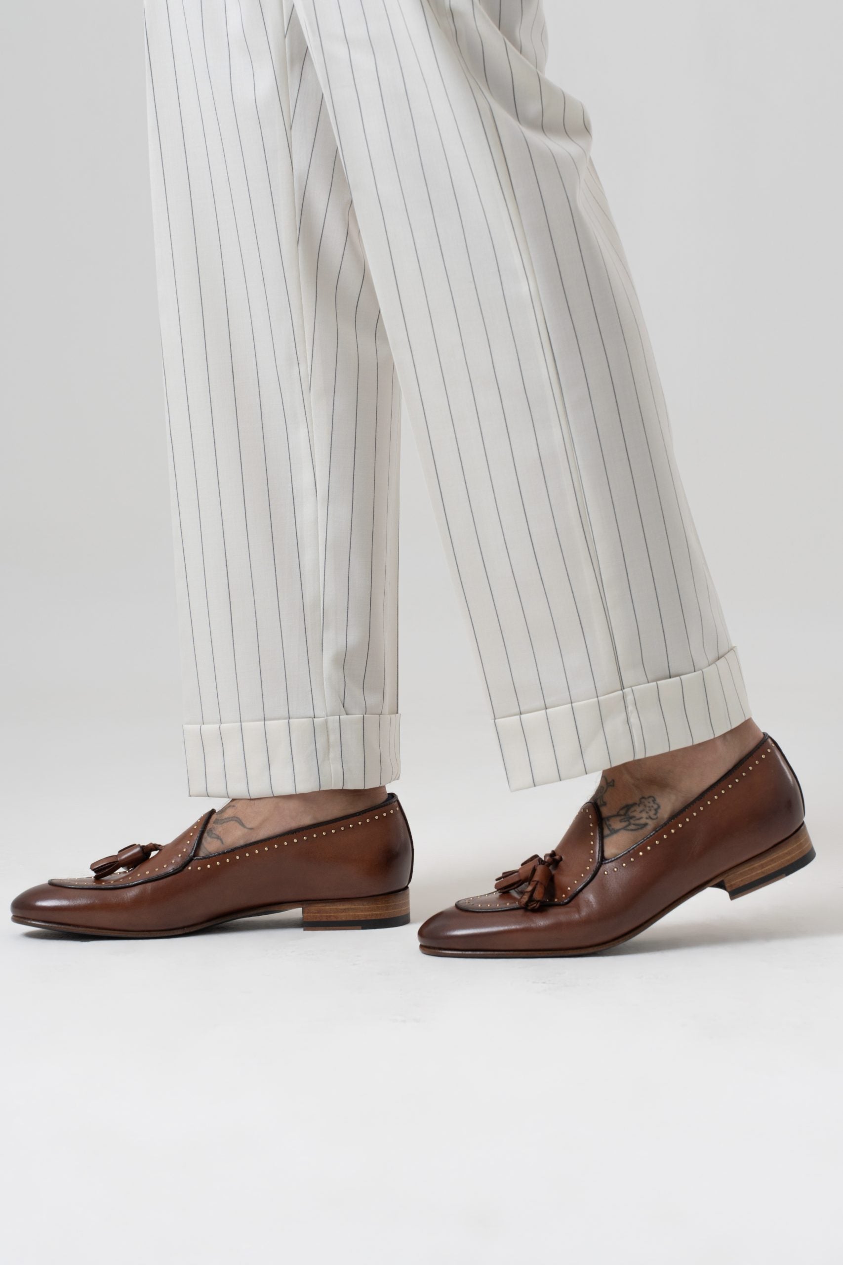 Pantalones de pierna ancha con hebillas laterales en rayas color crema y azul Riviera