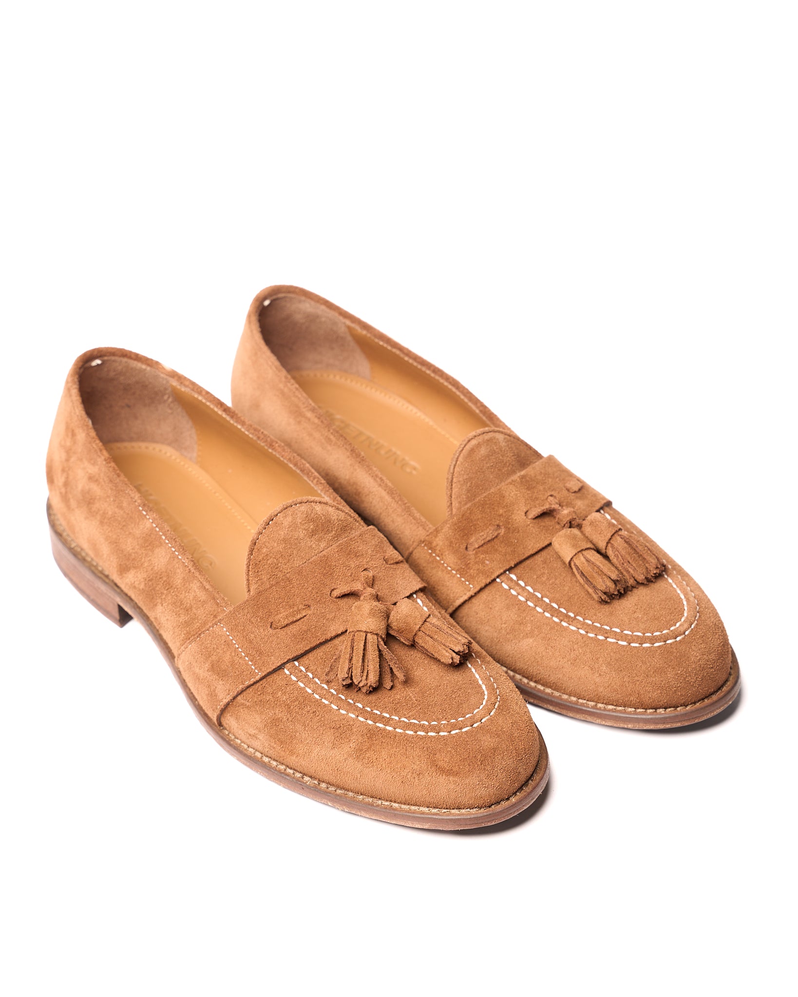 Mocasín con borlas de piel negra