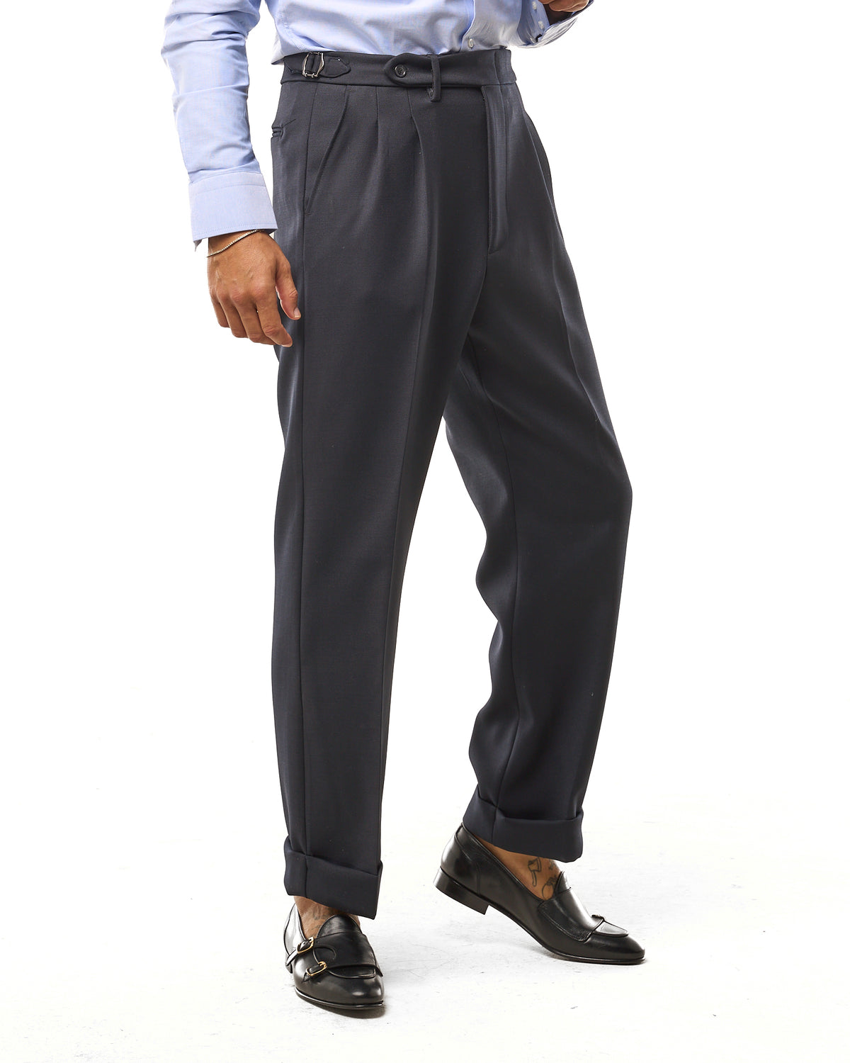 Wide-bottom trousers with diagonal side buckles in blue